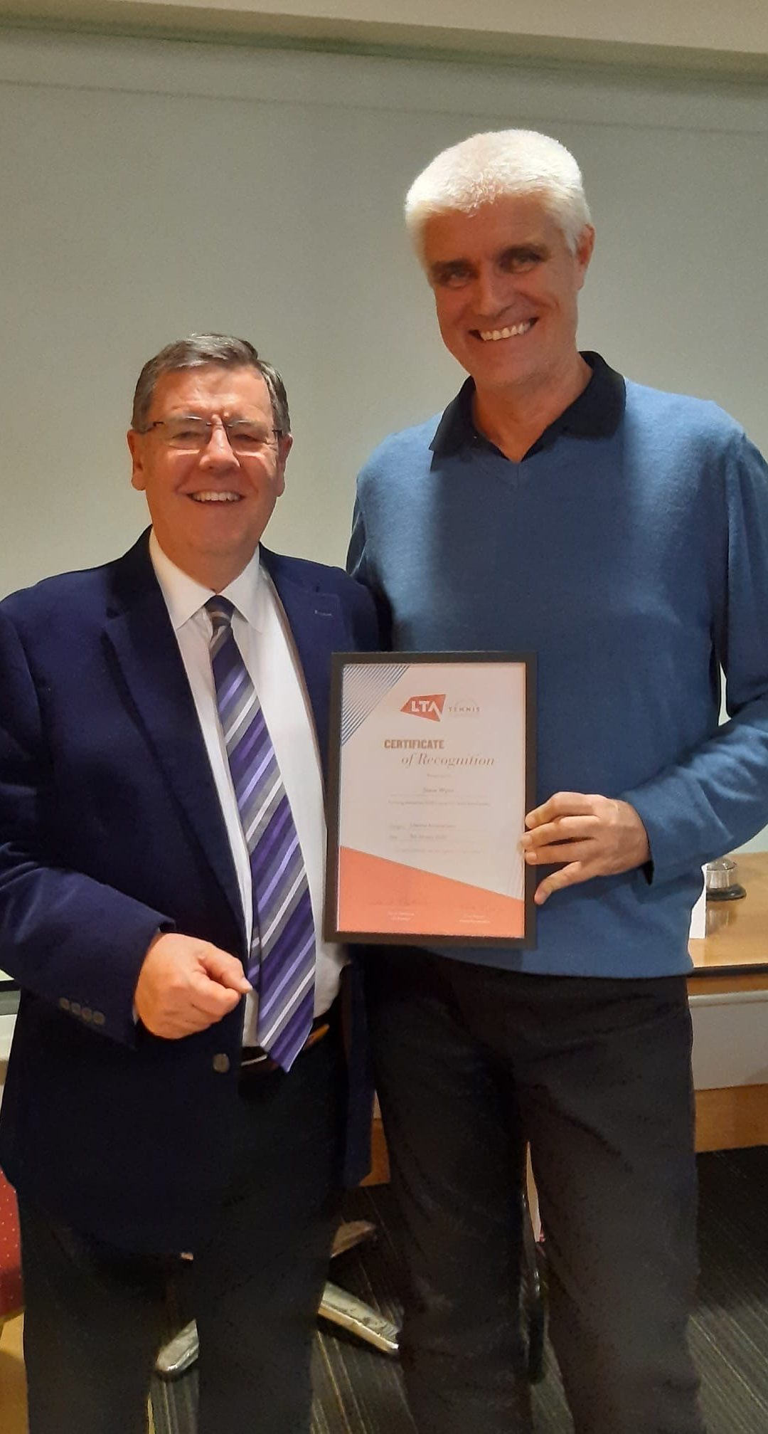 Steve Wynn receiving his LTA Lifetime Achievement Award from Essex Tennis President, Richard Lehman